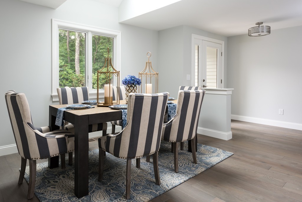 148 Paddock Circle Mashpee, MA 02649 - Photo 12 of 28 a view of a dining room with furniture window and outside view