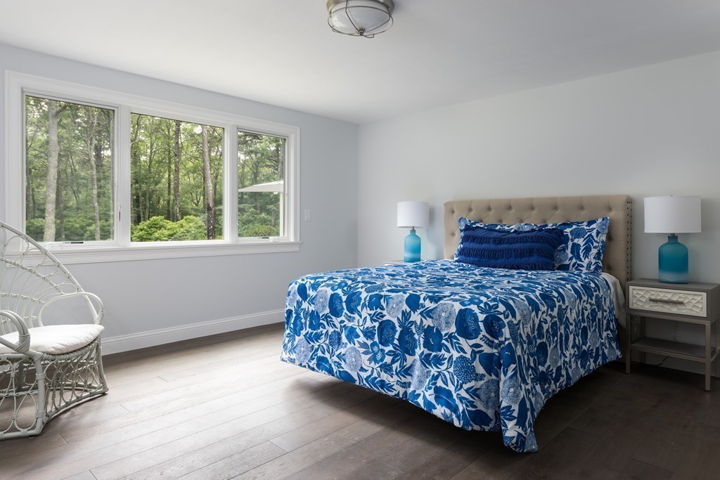 148 Paddock Circle Mashpee, MA 02649 - Photo 14 of 28 a bedroom with a bed and a window