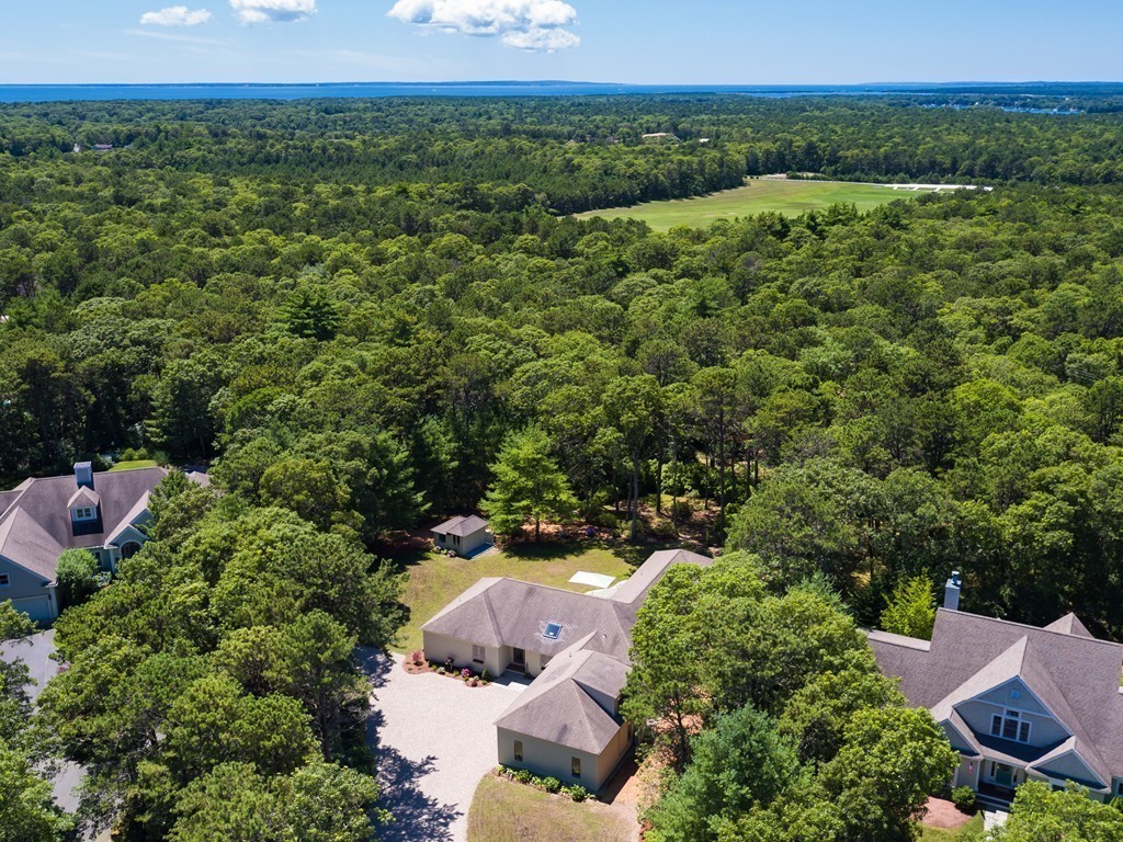 148 Paddock Circle Mashpee, MA 02649 - Photo 19 of 28 a view of a lush green field