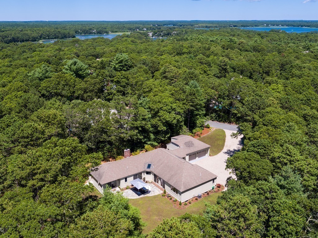 148 Paddock Circle Mashpee, MA 02649 - Photo 27 of 28 a view of a house with a yard and mountain