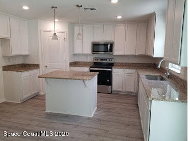 868 Corbin Circle Southwest Palm Bay, FL 32908 - Photo 4 of 15 Kitchen Prado B Lot 32A