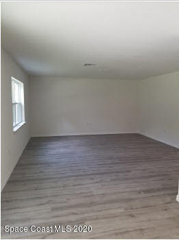 868 Corbin Circle Southwest Palm Bay, FL 32908 - Photo 6 of 15 Great room Prado B Lot 32A