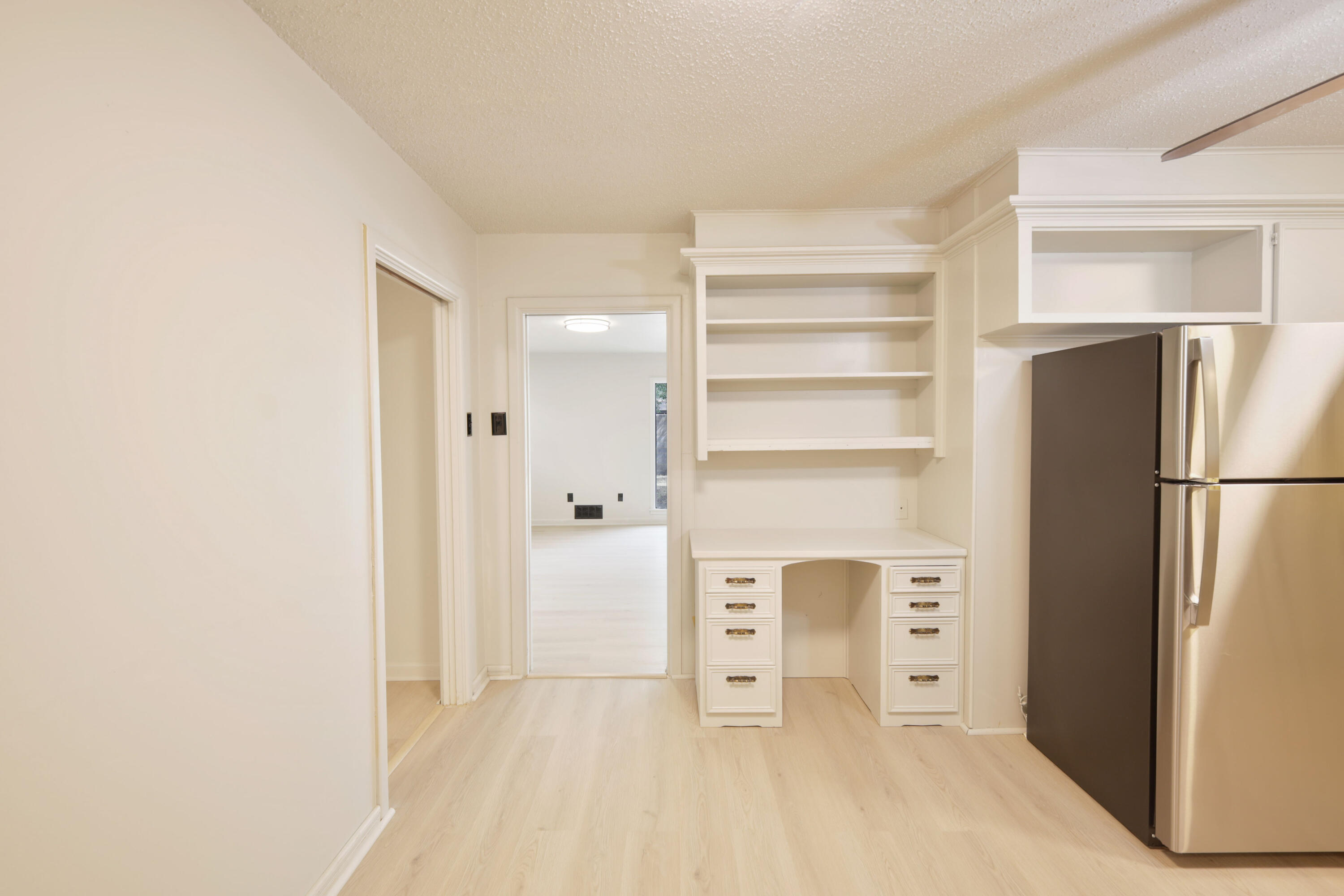 3202 45th Street Lubbock, TX 79413 - Photo 7 of 20 a view of walk in closet with empty racks
