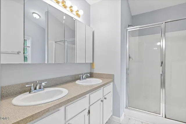 a bathroom with a shower and a toilet