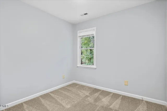 an empty room with window