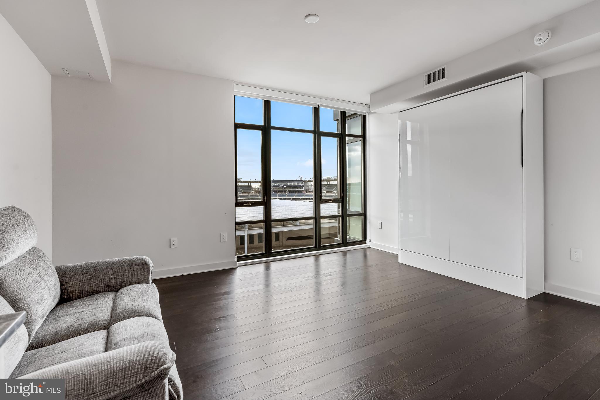 70 N Street Southeast, Unit N815 Washington, DC 20003 - Photo 8 of 27 a view of livingroom with furniture and wooden floor