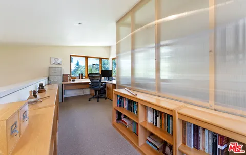 a room with furniture and a window