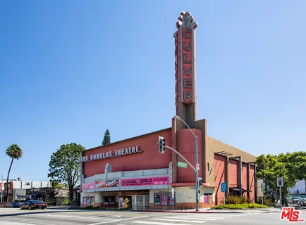 a view of a building with a street