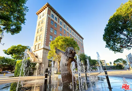 a view of a building with a tree