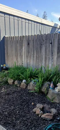 a view of a wooden fence