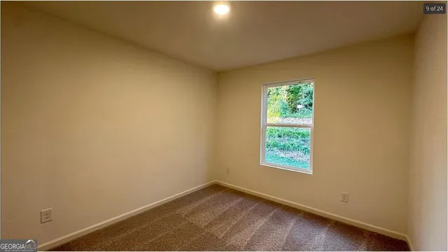 an empty room with window
