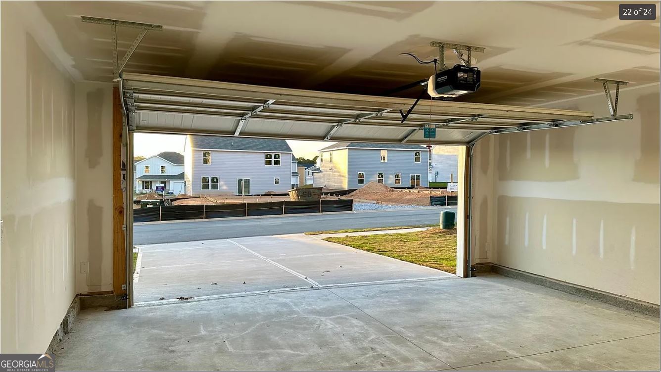 486 Grand Magnolia Street Jackson, GA 30233 - Photo 3 of 24 a view of parking garage