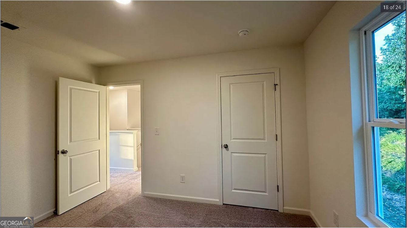 486 Grand Magnolia Street Jackson, GA 30233 - Photo 7 of 24 a view of an empty room