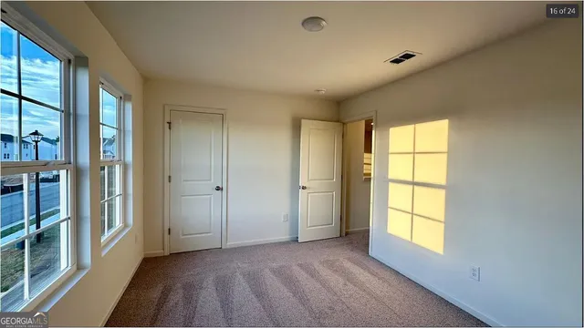 an empty room with windows