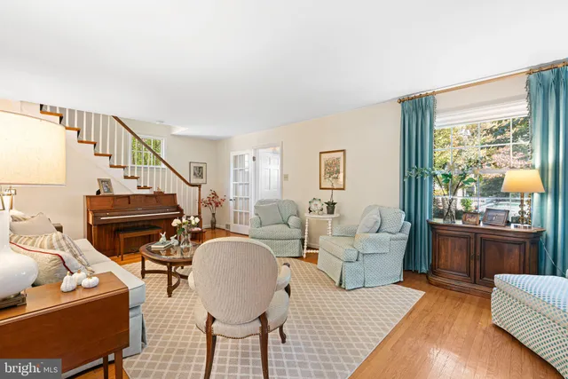 a living room with furniture fireplace and a flat screen tv