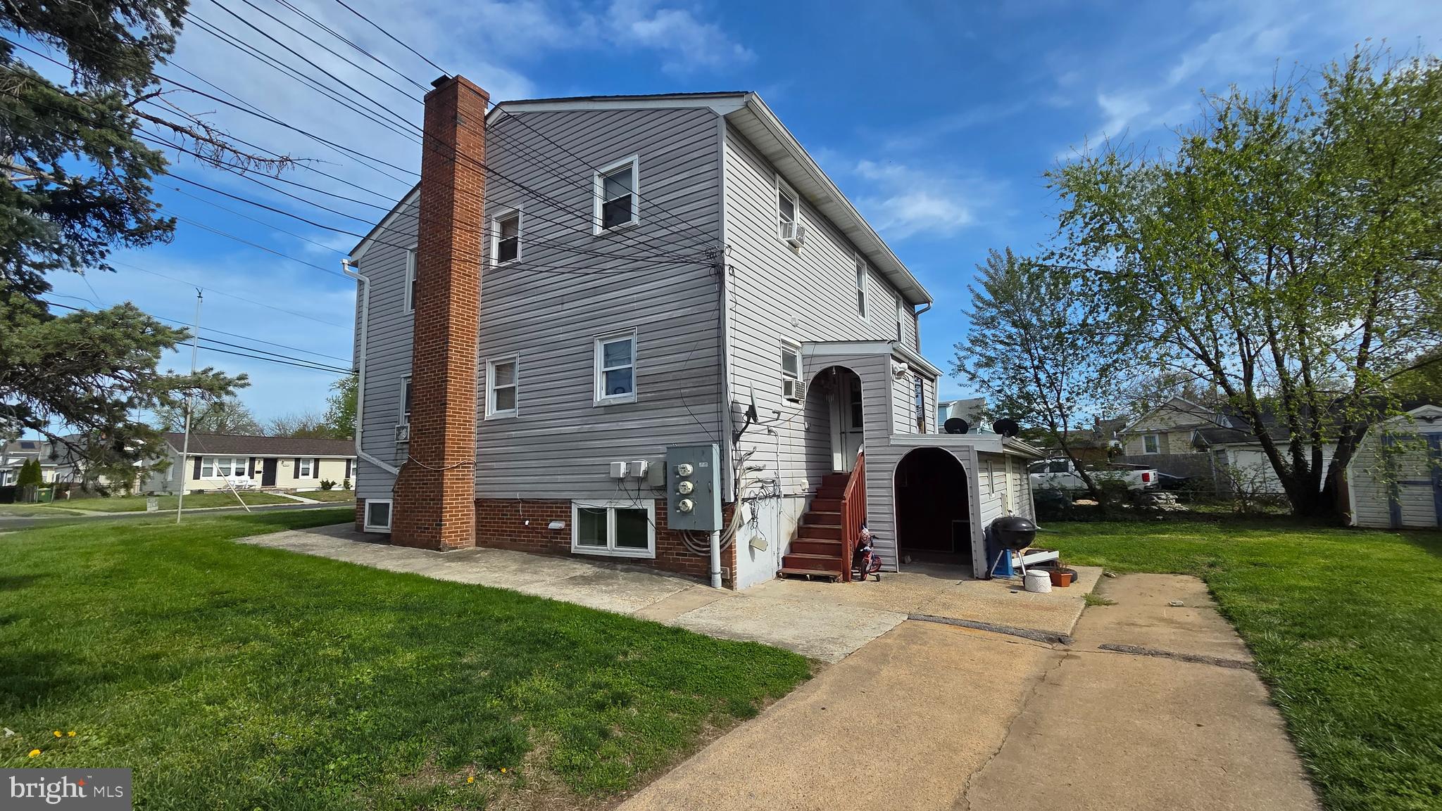 4400 4th Street Baltimore, MD 21225 - Photo 1 of 25 a view of a house with a yard