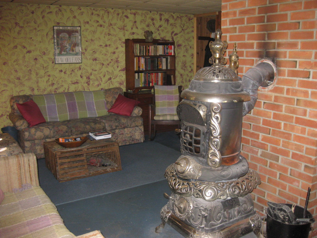 162 Chipman Road Middlefield, MA 01011 - Photo 10 of 11 a living room with furniture and a fireplace
