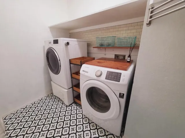a utility room with dryer and washer
