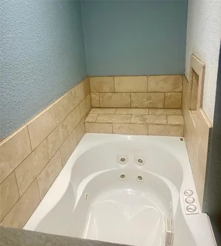 a bathroom with a bathtub