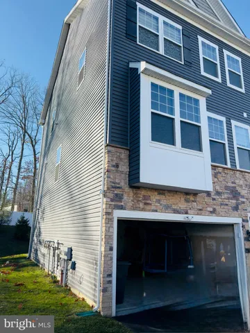 a view of house with yard