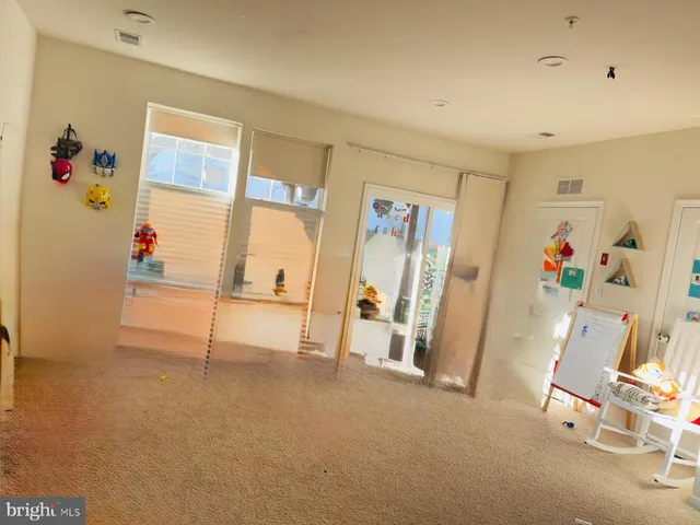 a view of a room with an entryway