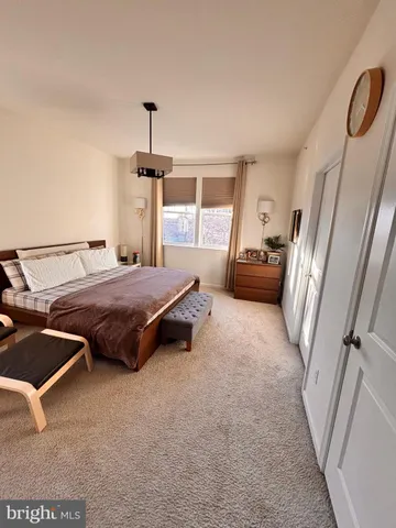 a room with furniture and a window