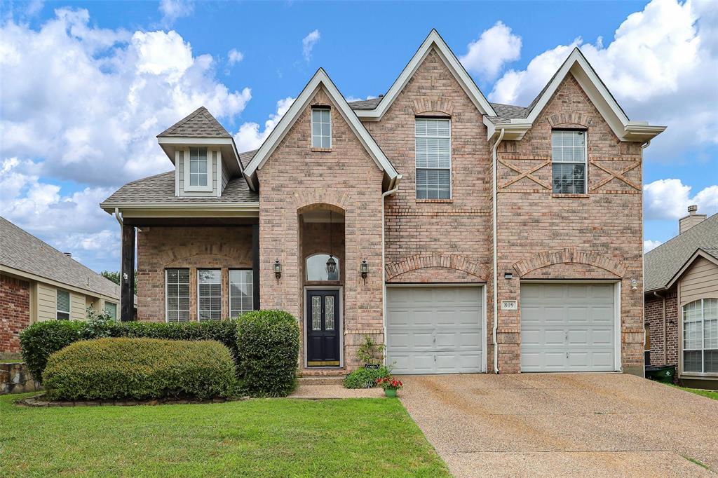 809 Willow Tree Drive McKinney, TX 75071 - Photo 1 of 1 a front view of a house with a garden