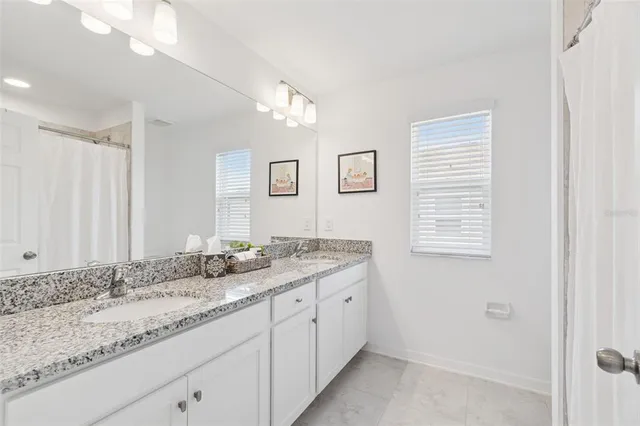 an aerial view of a pool patio swimming pool and outdoor seating