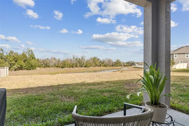 an aerial view of a house with a swimming pool