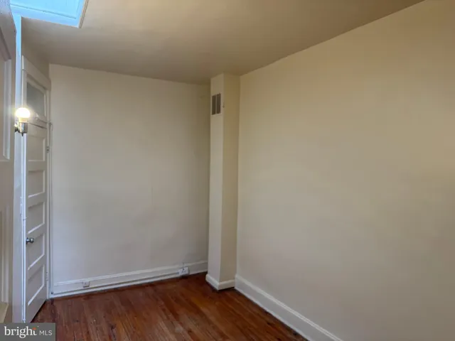 a view of small space with wooden floor