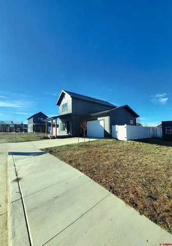 a view of living room and kitchen