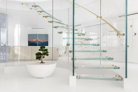 a bathroom with a bathtub and shower