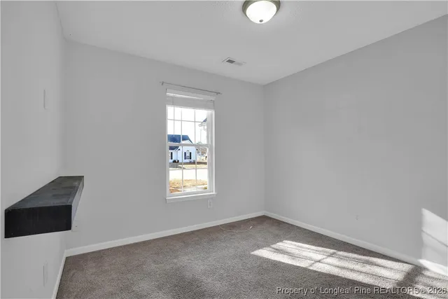 a view of a room with racks on the wall