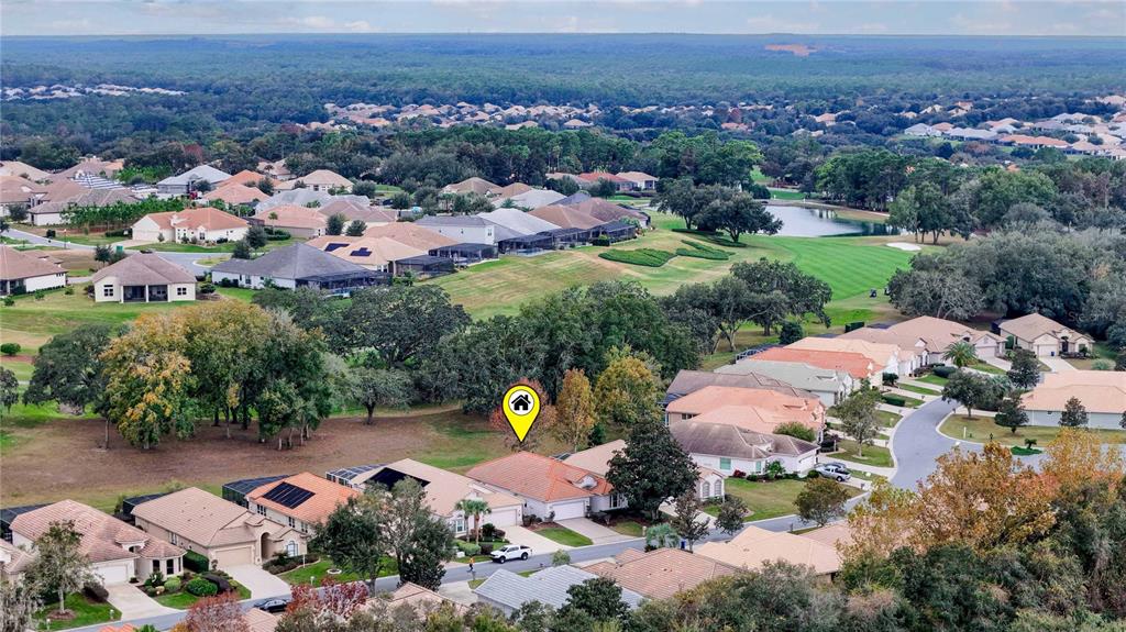 680 West Doerr Path Hernando, FL 34442 - Photo 48 of 48 an aerial view of a swimming pool and mountain view in back