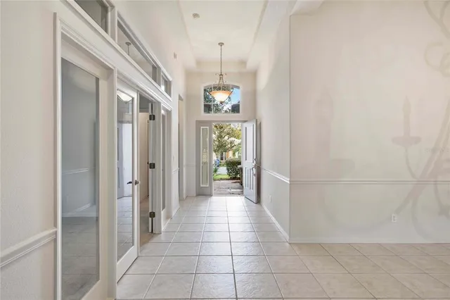 a large kitchen with stainless steel appliances granite countertop a sink and a stove