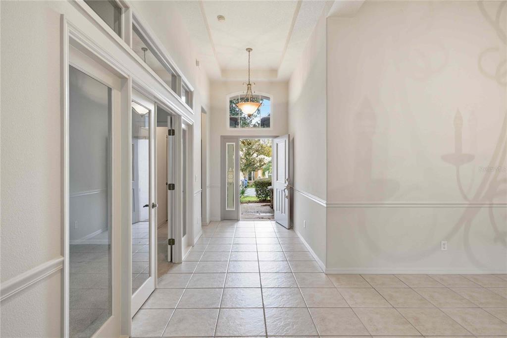 680 West Doerr Path Hernando, FL 34442 - Photo 8 of 48 a hallway with windows and stairs