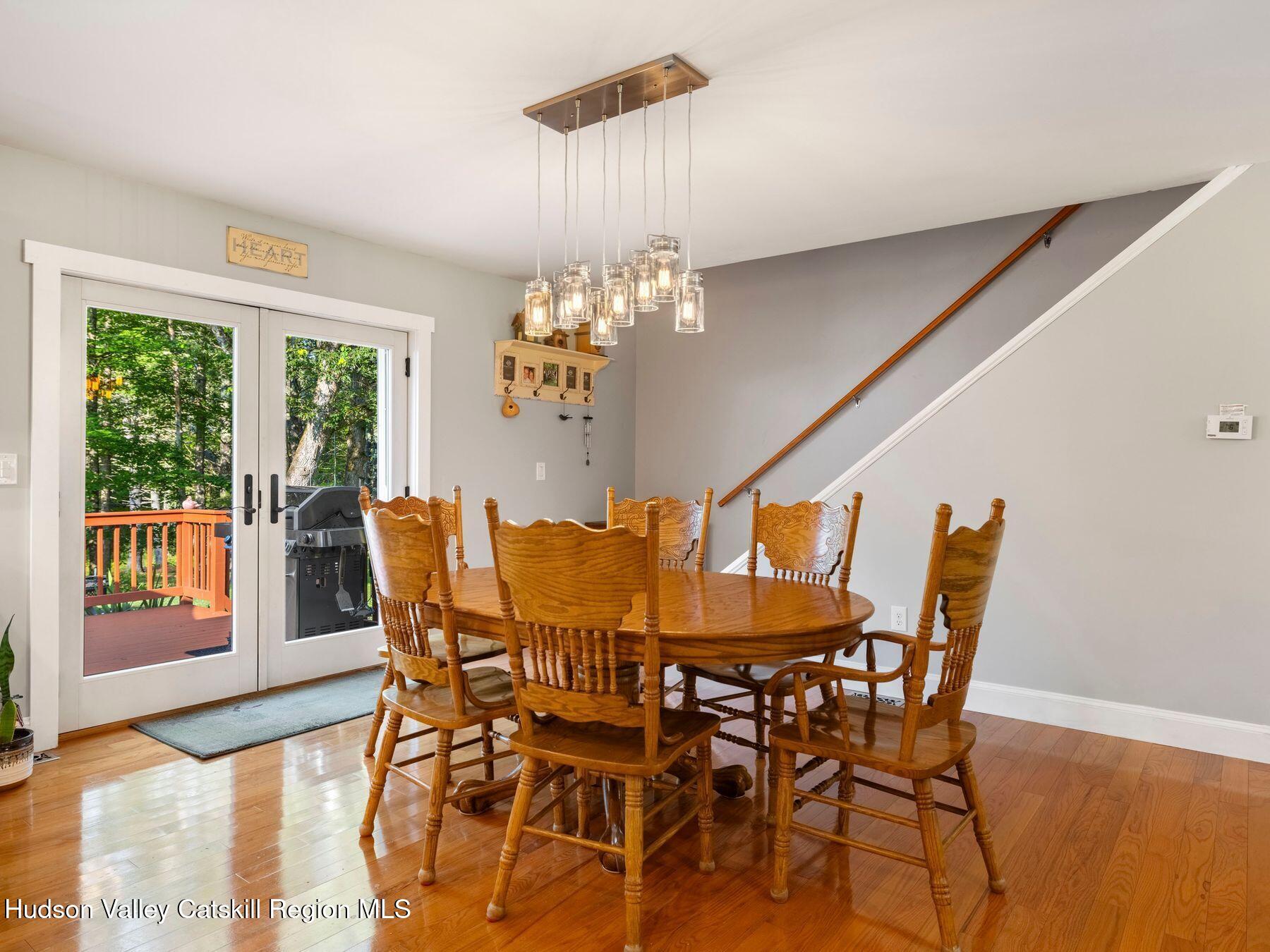 15 Pine Street Cairo, NY 12413 - Photo 12 of 46 a view of a dining room with furniture a chandelier and wooden floor