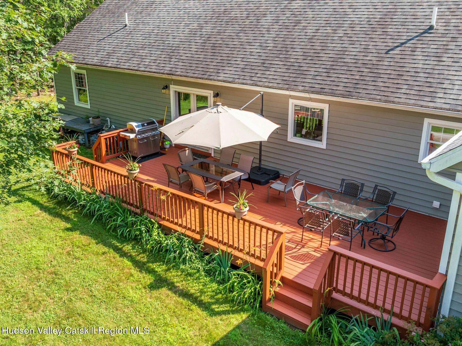 15 Pine Street Cairo, NY 12413 - Photo 13 of 46 a view of a deck with furniture and a yard