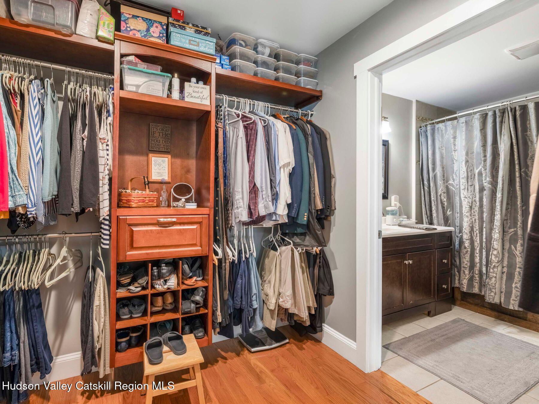 15 Pine Street Cairo, NY 12413 - Photo 18 of 46 a view of walk in closet with clothes and shoes