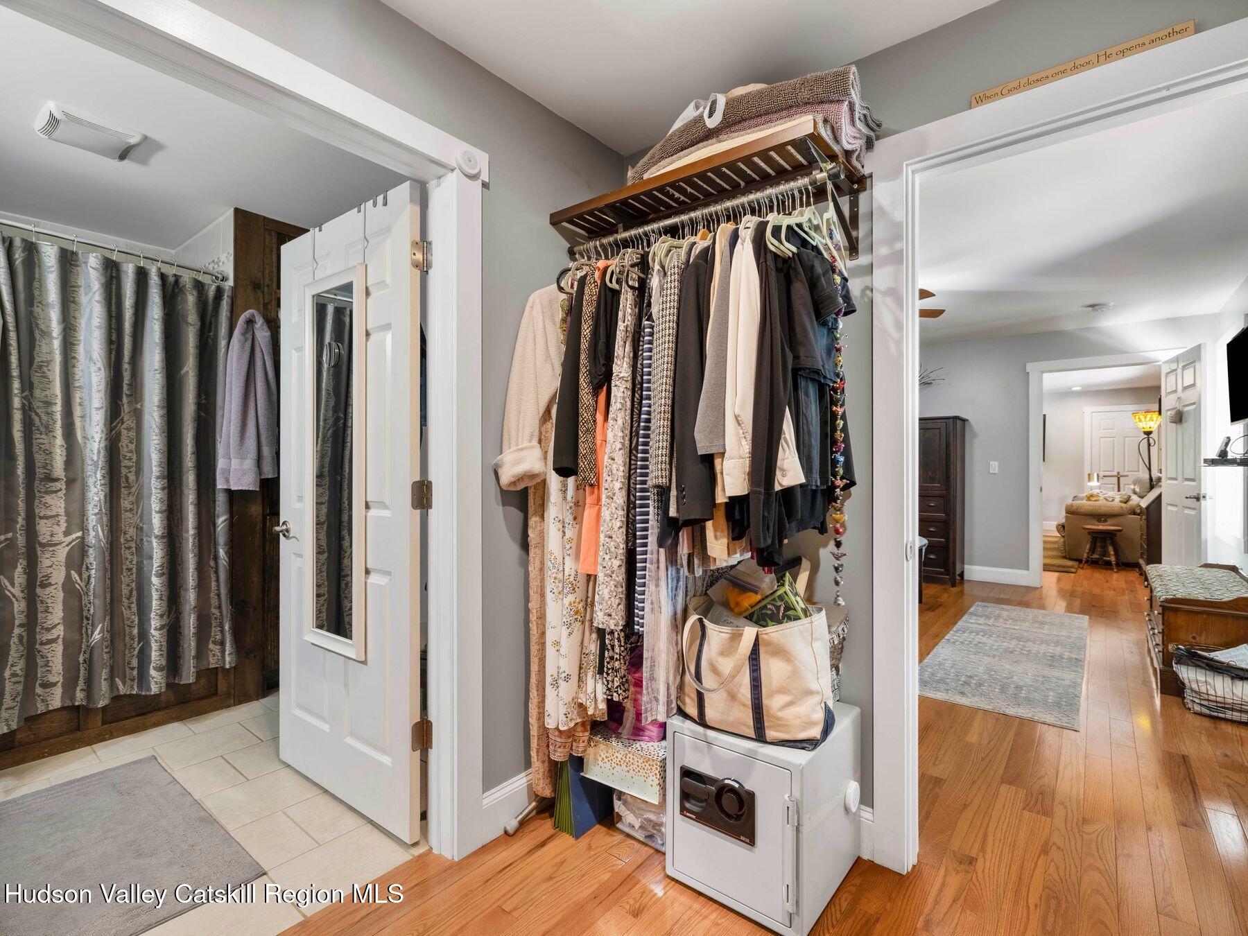15 Pine Street Cairo, NY 12413 - Photo 19 of 46 a view of walk in closet with clothes and shoes