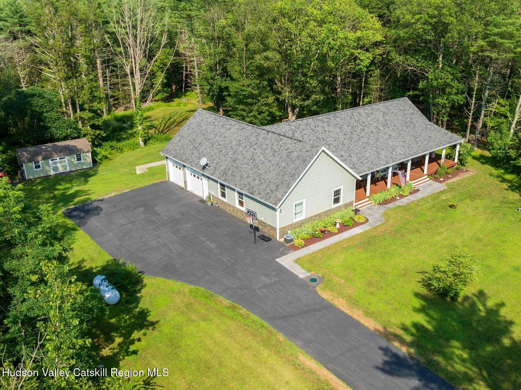 15 Pine Street Cairo, NY 12413 - Photo 2 of 46 an aerial view of a house with swimming pool