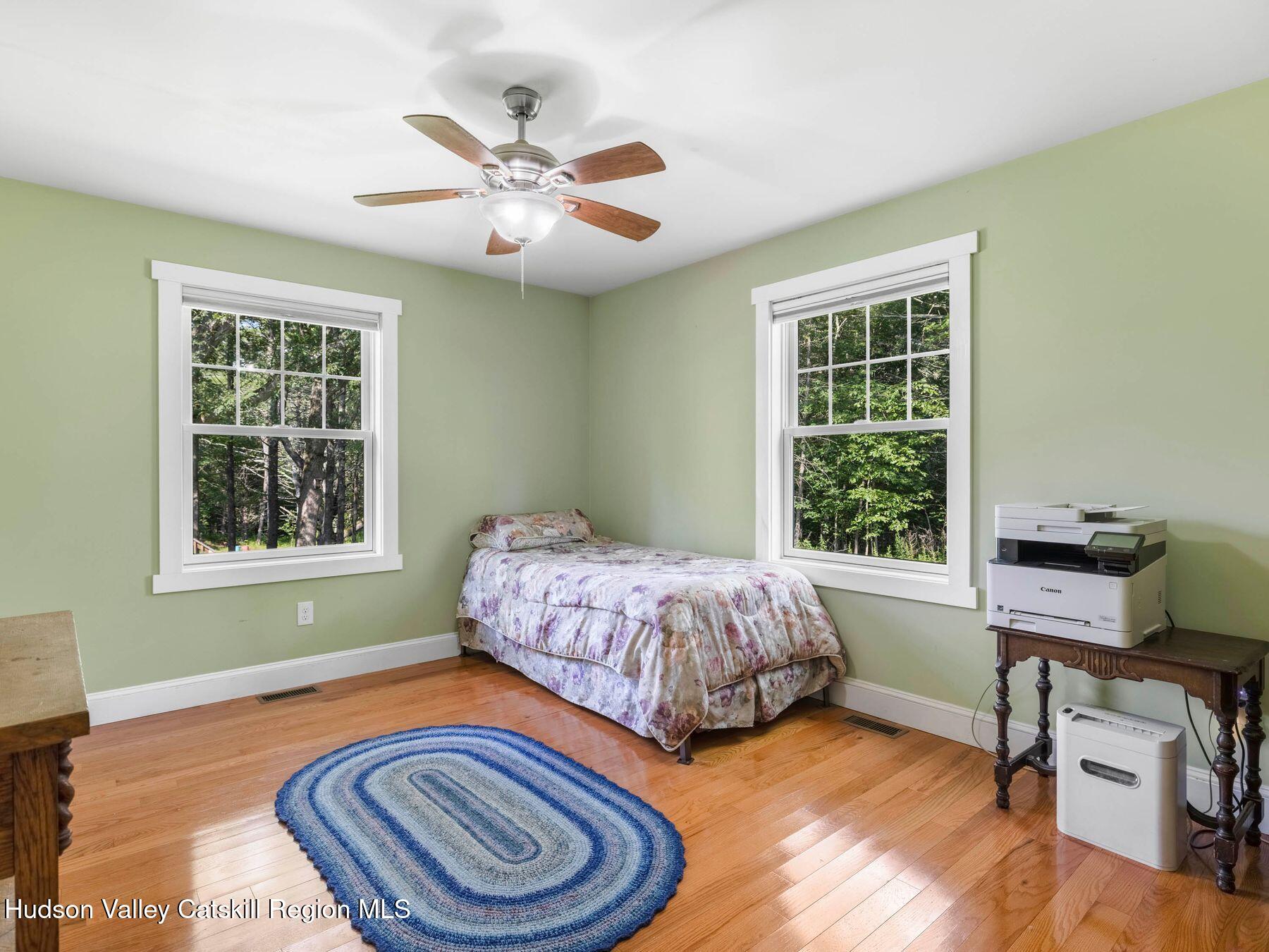 15 Pine Street Cairo, NY 12413 - Photo 23 of 46 a bedroom with a bed and a window