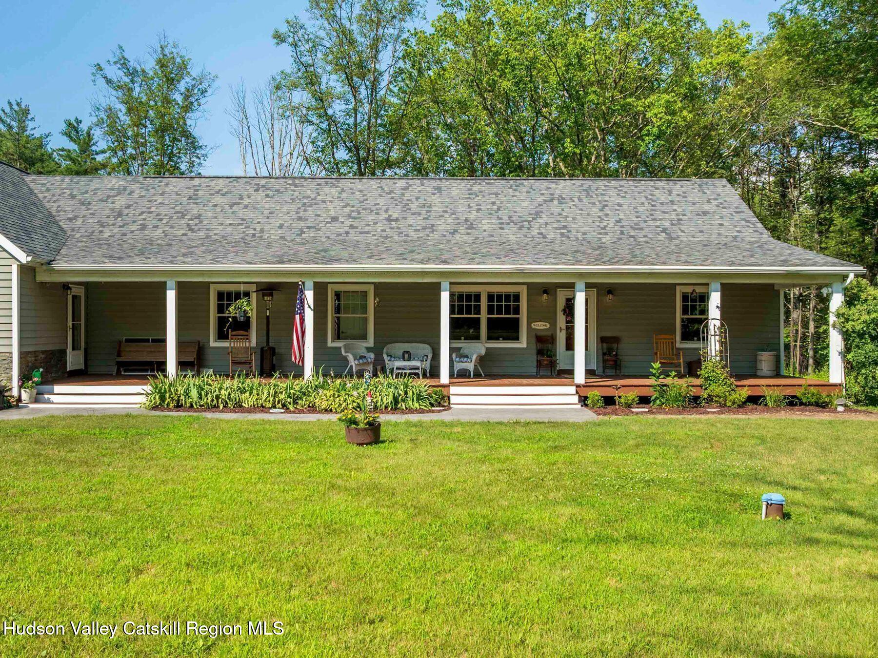 15 Pine Street Cairo, NY 12413 - Photo 28 of 46 a view of a house with sitting area and garden