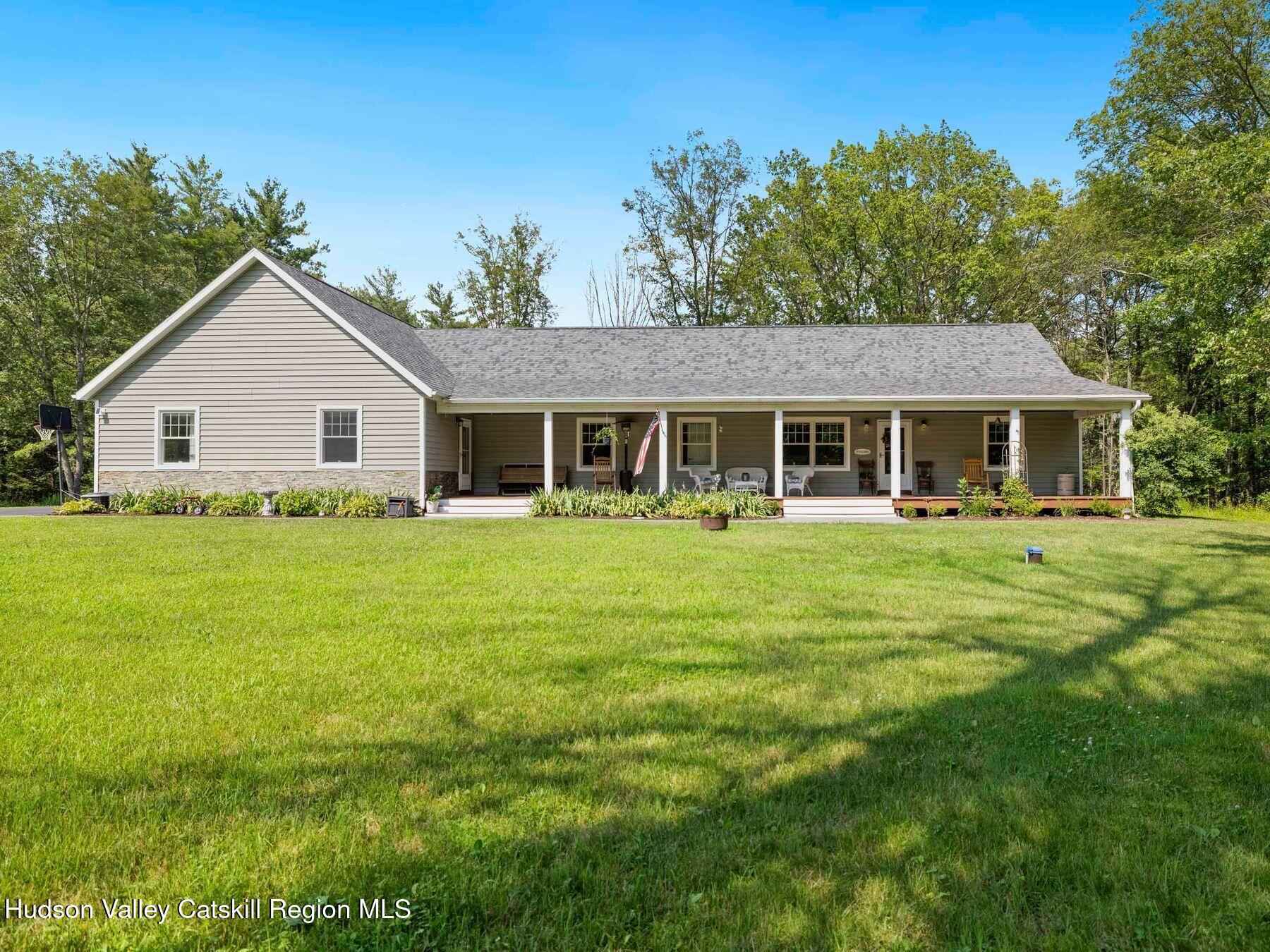 15 Pine Street Cairo, NY 12413 - Photo 38 of 46 a front view of house with yard and green space