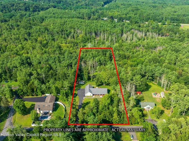 a view of a house with a big yard