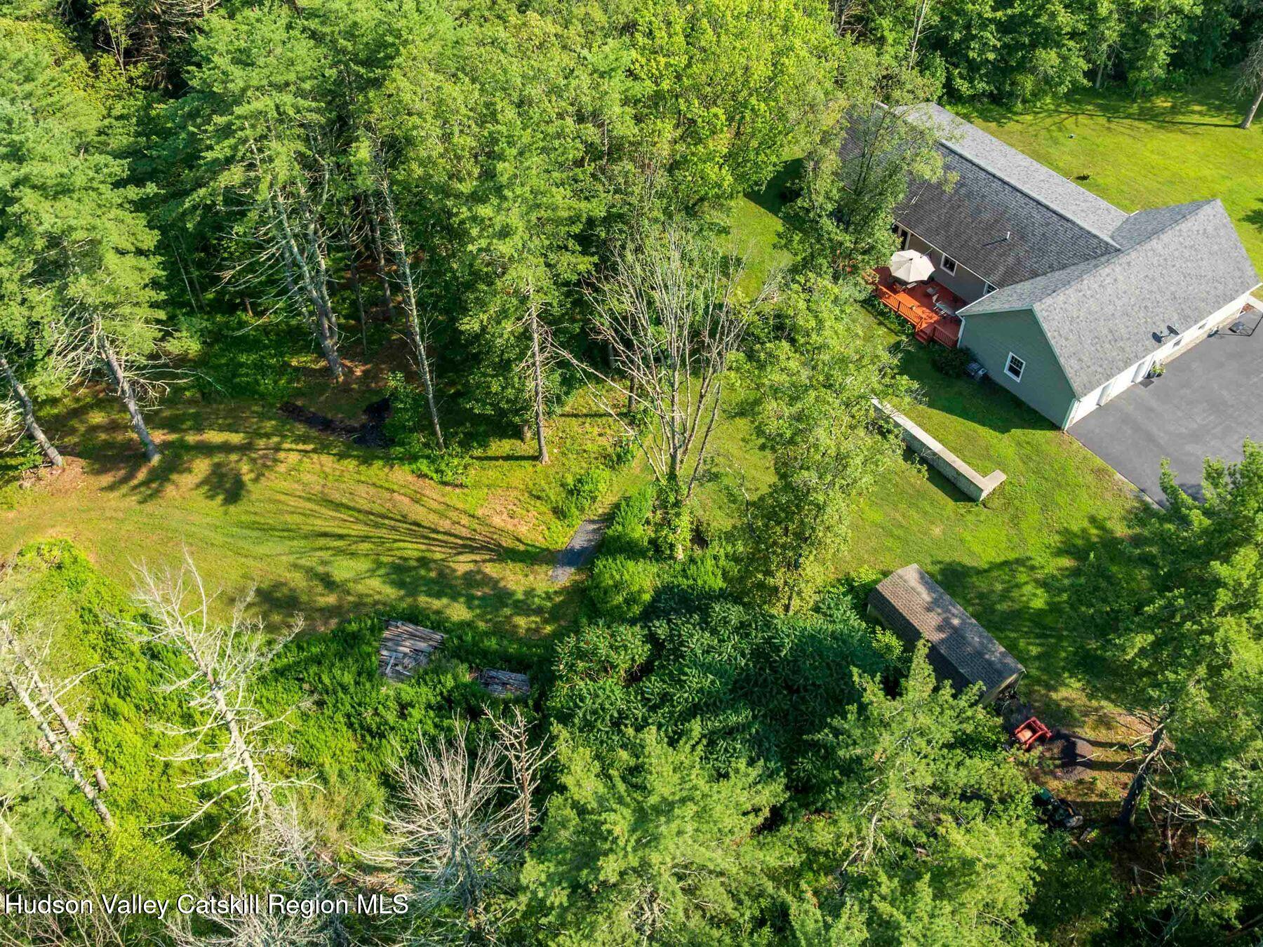 15 Pine Street Cairo, NY 12413 - Photo 45 of 46 an aerial view of a house with a yard swimming pool outdoor seating and yard