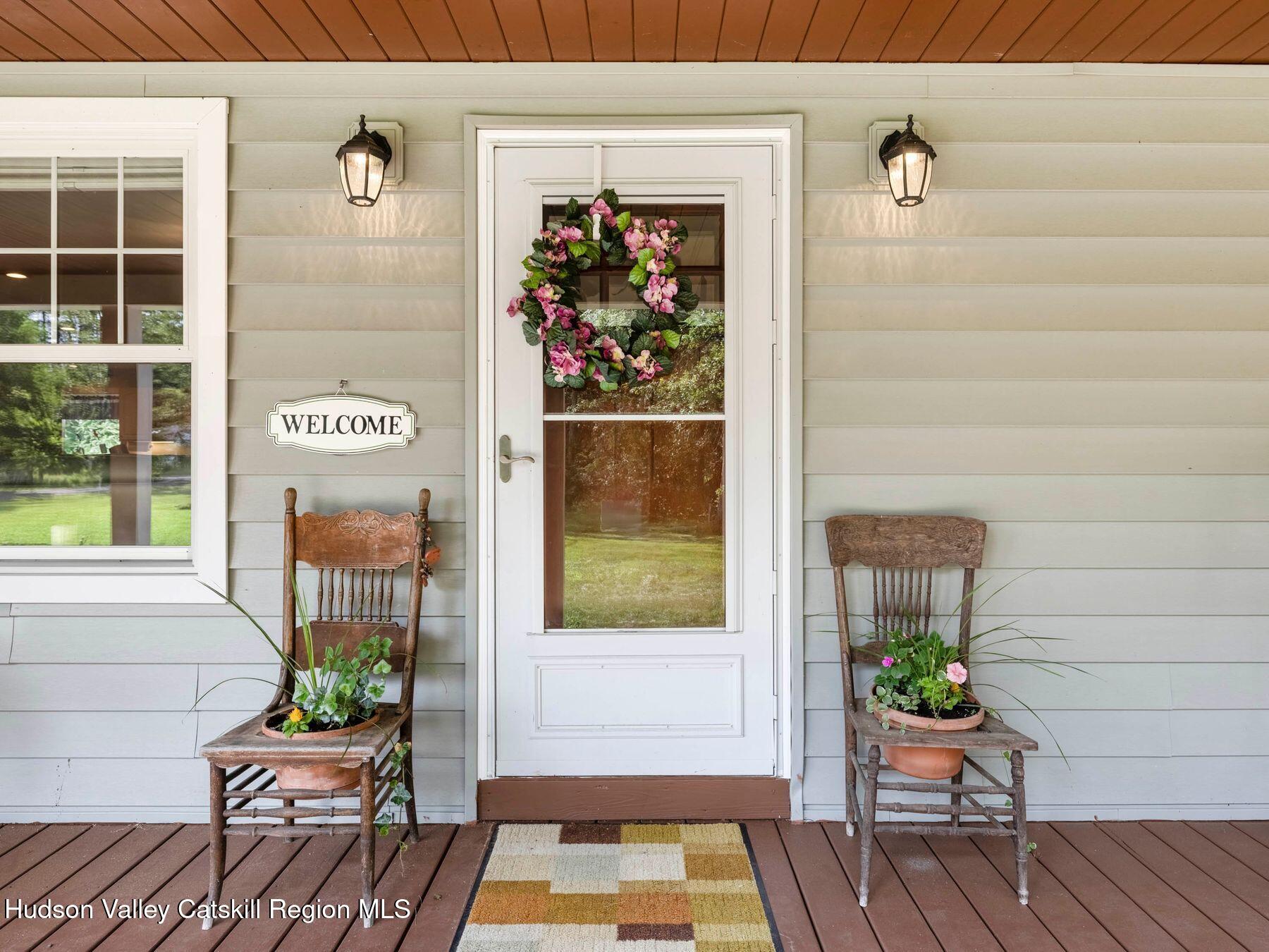 15 Pine Street Cairo, NY 12413 - Photo 7 of 46 a house with trees in front of it