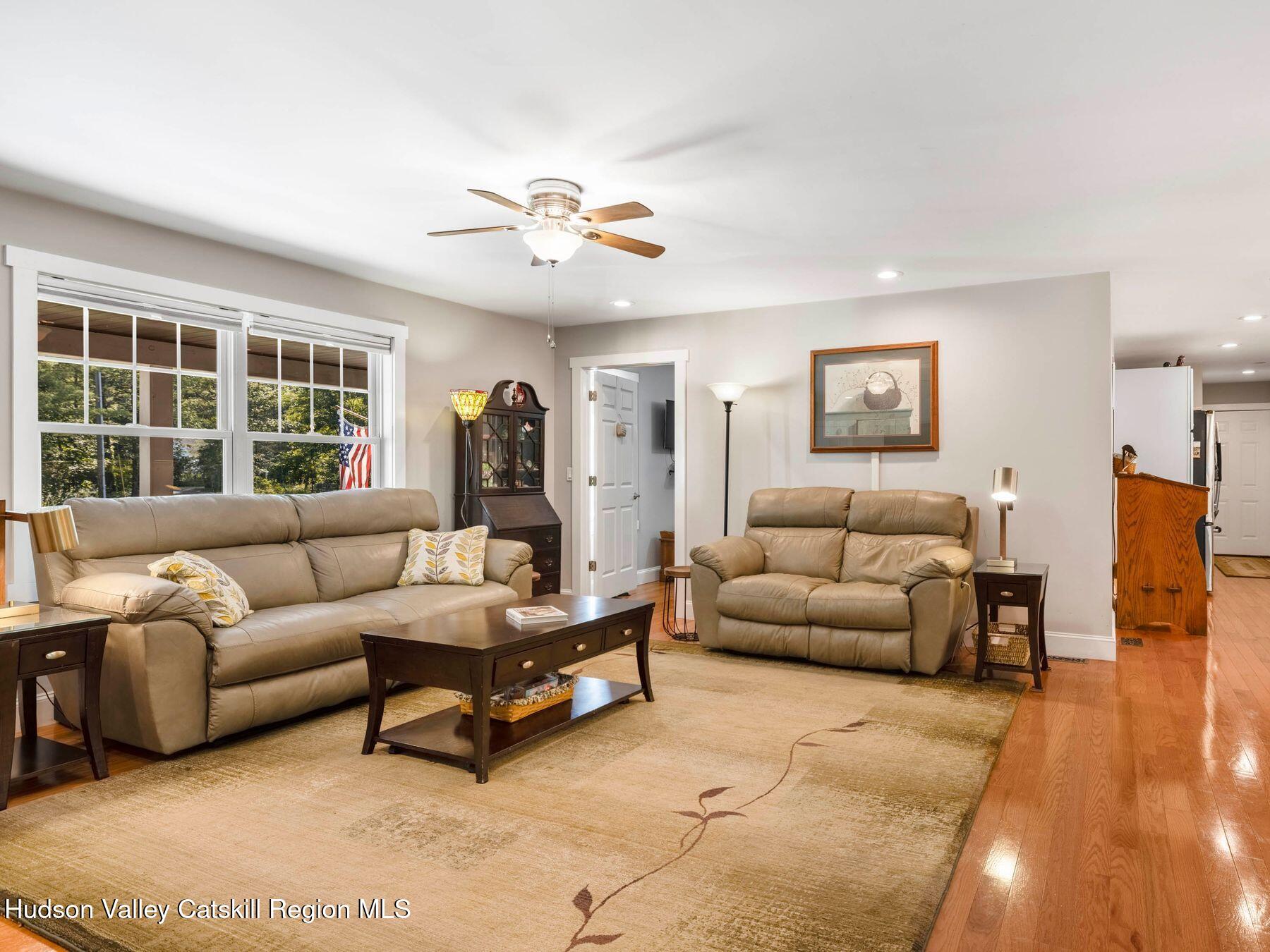 15 Pine Street Cairo, NY 12413 - Photo 9 of 46 a living room with furniture and a large window