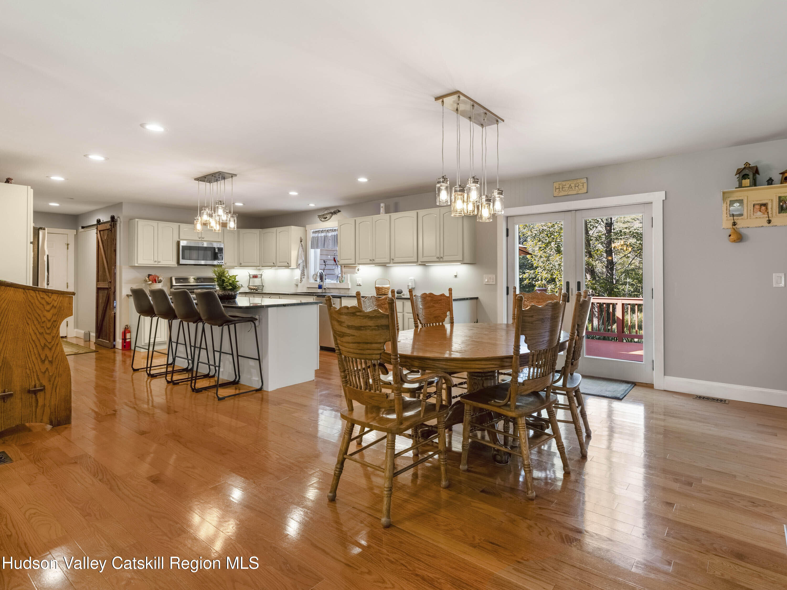 15 Pine Street Cairo, NY 12413 - Photo 10 of 46 a view of a dining room with furniture window and wooden floor