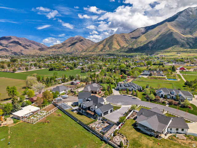 1720 Hillcrest Circle Mapleton, UT 84664 - Photo 26 of 116 Aerial overview of property's location featuring a mountainous background and nearby suburban area